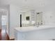 Bright kitchen featuring white cabinets and modern appliances at 2918 Avenue E, Holmes Beach, FL 34217