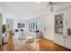 Bright living room with hardwood floors, comfortable seating, and view to the outdoors at 2918 Avenue E, Holmes Beach, FL 34217