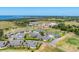 Scenic aerial view of a residential community near the coast featuring lovely homes and lush green spaces at 3007 Live Oak Ln, Palmetto, FL 34221