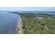 Stunning aerial view of Emerson Point Preserve, showcasing lush greenery, clear waters, and natural beauty at 3007 Live Oak Ln, Palmetto, FL 34221