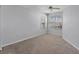 Bedroom with neutral carpet and lots of natural light from the window at 3007 Live Oak Ln, Palmetto, FL 34221