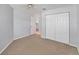 Bedroom with neutral carpet and closet space at 3007 Live Oak Ln, Palmetto, FL 34221