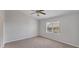 Bedroom with neutral carpet and lots of natural light from the window at 3007 Live Oak Ln, Palmetto, FL 34221