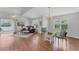 Spacious living room with hardwood floors, lots of natural light, and comfortable seating at 3007 Live Oak Ln, Palmetto, FL 34221