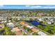 Expansive aerial view of a residential community, featuring serene lakes and well-maintained homes at 4180 Via Mirada, Sarasota, FL 34238