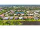 Overhead view showcasing luxurious homes around a pond in a well-manicured community at 4180 Via Mirada, Sarasota, FL 34238