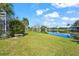 Well maintained backyard with view of lake from backyard at 4180 Via Mirada, Sarasota, FL 34238
