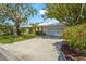 Beautiful single-story home with a well-maintained lawn and a two car garage at 4180 Via Mirada, Sarasota, FL 34238