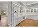 Bright eat-in kitchen featuring white appliances and cabinets at 4180 Via Mirada, Sarasota, FL 34238