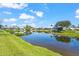 Still lake surrounded by neighborhood houses at 4180 Via Mirada, Sarasota, FL 34238