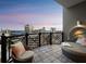 Relaxing balcony with comfortable seating and stunning city views at 50 Central Ave # 17Phd, Sarasota, FL 34236