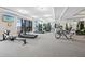 Well-equipped gym with treadmills, rowing machines, weight machines, and views of the ocean at 50 Central Ave # 17Phd, Sarasota, FL 34236
