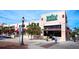 A large Whole Foods store front with a pedestrian walkway in front of the building at 50 Central Ave # 17Phd, Sarasota, FL 34236