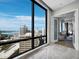 Breathtaking cityscape view from an expansive window highlighting a sunny sky and blue ocean waters at 50 Central Ave # 17Phd, Sarasota, FL 34236