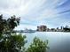 Scenic view of waterfront with docked yachts and condominium buildings across tranquil waters at 50 Central Ave # 17Phd, Sarasota, FL 34236