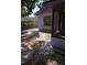 View of a backyard featuring a partially screened porch and a chain-link fence at 519 36Th E Ave, Bradenton, FL 34208