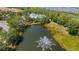 Scenic aerial view of the lake fountain near the community at 5633 Key Largo Ct # B-08, Bradenton, FL 34203