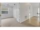 Bedroom featuring neutral walls, carpet flooring, a ceiling fan, and a double door closet at 5633 Key Largo Ct # B-08, Bradenton, FL 34203