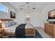 Comfortable bedroom with a ceiling fan, natural light, and ensuite bathroom at 5633 Key Largo Ct # B-08, Bradenton, FL 34203