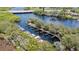 Elevated view of the community boat slips and the waterway, perfect for boating enthusiasts at 5633 Key Largo Ct # B-08, Bradenton, FL 34203