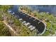 Aerial view of multiple private boat slips, with well-maintained docks available to homeowners at 5633 Key Largo Ct # B-08, Bradenton, FL 34203