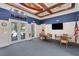 Large community room is perfect for entertaining with lots of chairs and tables at 5633 Key Largo Ct # B-08, Bradenton, FL 34203