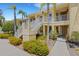 Inviting two-story condo building with well-manicured landscaping and charming exterior design at 5633 Key Largo Ct # B-08, Bradenton, FL 34203
