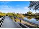 Enjoy the community walking bridge and enjoy the views of the waterway and natural landscape at 5633 Key Largo Ct # B-08, Bradenton, FL 34203