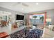 Comfortable living room with a large window providing scenic ocean views and bright light at 6470 Mourning Dove Dr # 201, Bradenton, FL 34210