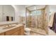 Bathroom with a frameless glass shower enclosure at 6819 Dominion Ln, Lakewood Ranch, FL 34202