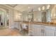 Bathroom with dual vanities and large wall mirror at 6819 Dominion Ln, Lakewood Ranch, FL 34202