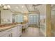 Bright bathroom suite featuring a make up vanity, soaking tub, and tiled shower at 6819 Dominion Ln, Lakewood Ranch, FL 34202