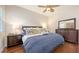 Well-lit primary bedroom with two bedside tables at 6819 Dominion Ln, Lakewood Ranch, FL 34202