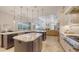Lovely kitchen with an open concept and seamless flow to the backyard, living room, and dining area at 6819 Dominion Ln, Lakewood Ranch, FL 34202