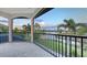 Enjoy evening lake views from this screened-in patio, perfect for relaxing and unwinding outdoors at 6819 Dominion Ln, Lakewood Ranch, FL 34202