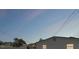 Exterior view of the backyard and house with outdoor lighting at 7141 37Th N Ave, St Petersburg, FL 33710