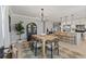 Bright dining area open to the kitchen with modern furnishings, decor and natural light at 7141 37Th N Ave, St Petersburg, FL 33710