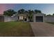 Charming home with a well-manicured lawn, and a one car garage at 7141 37Th N Ave, St Petersburg, FL 33710