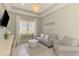 Comfortable living room with stylish furniture, decorative lighting and a serene atmosphere at 749 Tailwind Pl, Sarasota, FL 34240