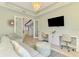 Inviting living room featuring comfortable seating, a modern desk and an open floor plan at 749 Tailwind Pl, Sarasota, FL 34240