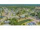 Aerial view of the houses within a lush, green community at 7912 Estates Dr, Sarasota, FL 34243