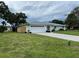 Charming single-story home featuring a well-manicured lawn and a two-car garage at 7912 Estates Dr, Sarasota, FL 34243