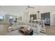 Open living room with modern kitchen and dining area, perfect for entertaining at 8001 20Th W Pl, Bradenton, FL 34209