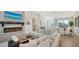 Inviting living room with a fireplace and neutral color palette at 8001 20Th W Pl, Bradenton, FL 34209