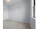 Bright bedroom features tile flooring, natural light, and closet for storage at 8229 Grande Shores Dr, Sarasota, FL 34240