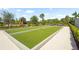 Well-manicured Bocce ball court, part of the community's outdoor recreational space at 8229 Grande Shores Dr, Sarasota, FL 34240