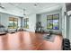 Community gym featuring treadmills, bikes, stair climbers, and hardwood floors at 8229 Grande Shores Dr, Sarasota, FL 34240