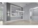 Spacious living area with modern light fixtures, open floor plan and stylish design at 8229 Grande Shores Dr, Sarasota, FL 34240