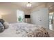 This bedroom offers a large closet, neutral colored walls and soft carpeting for a clean aesthetic at 8297 Barton Farms Blvd, Sarasota, FL 34240