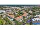 Aerial view showcases the building's location with mature trees and convenient parking at 850 S Tamiami Trl # 624, Sarasota, FL 34236